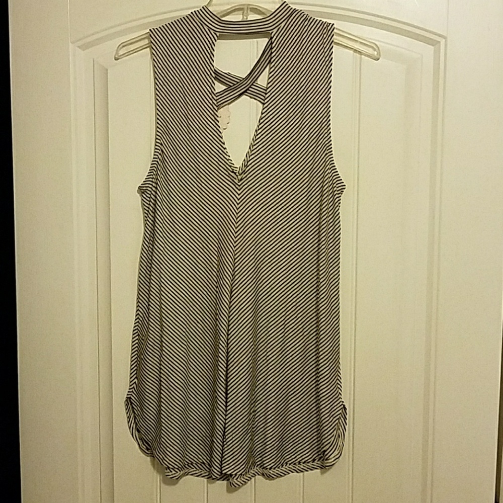 Brand new with tags. Soprano top.